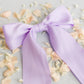 SPRING '24: Grace & Grandeur Bailee Satin Bow Barrette: Lavender